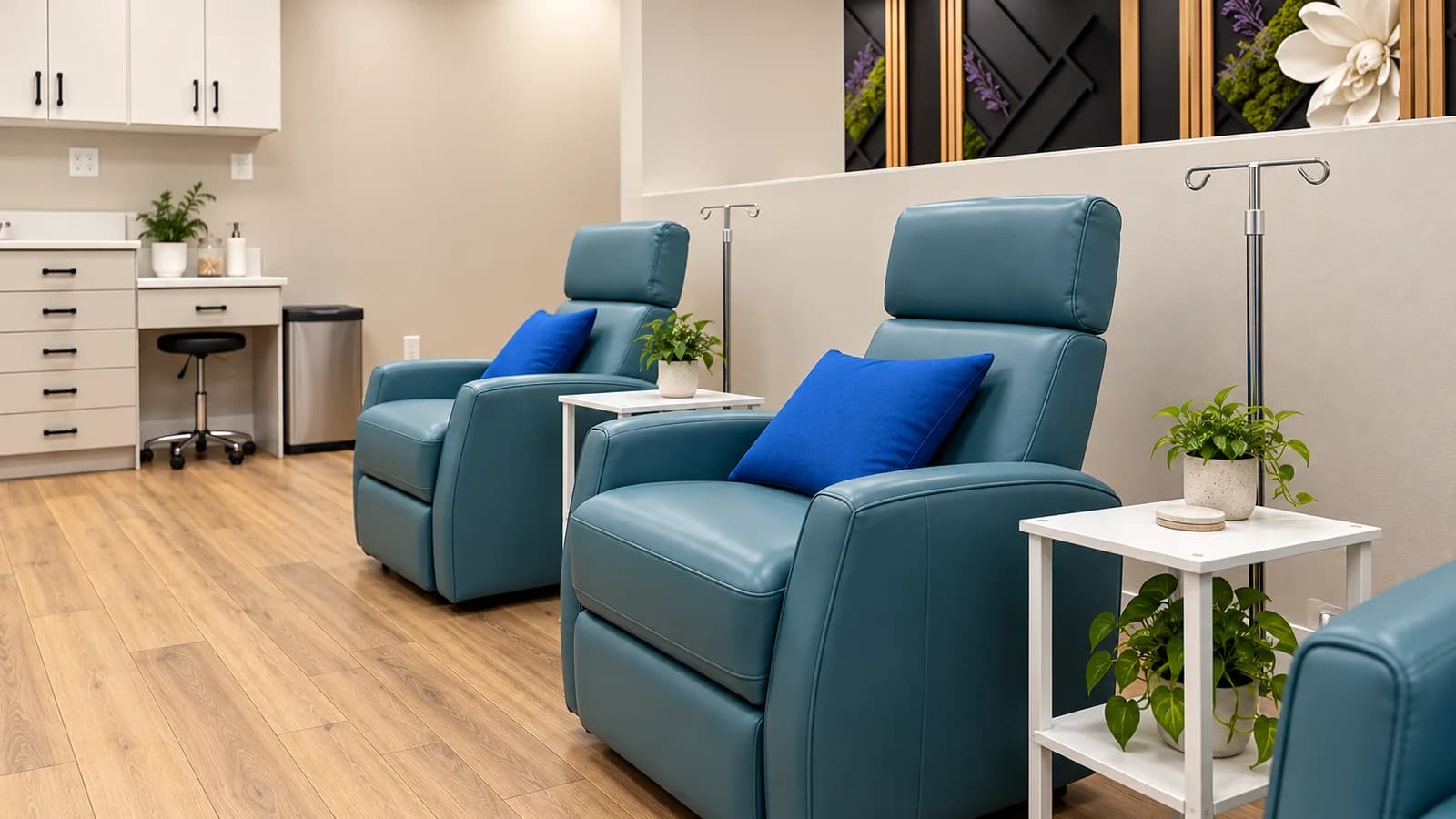 Teal recliners and oak-floor lounge inspired by the premises.